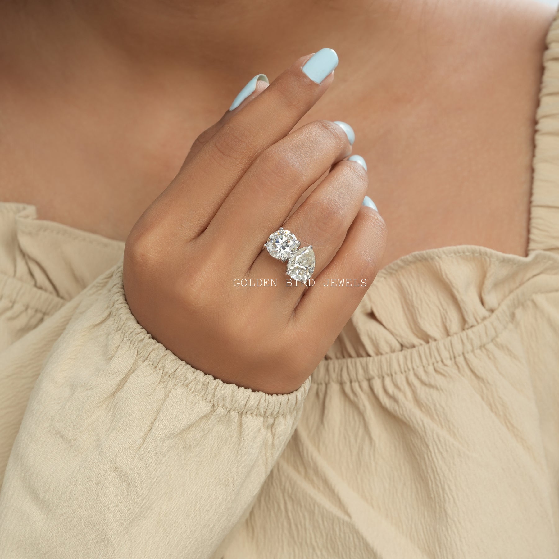 View of Round Cut Moissanite Toi Et Moi Ring In White Gold