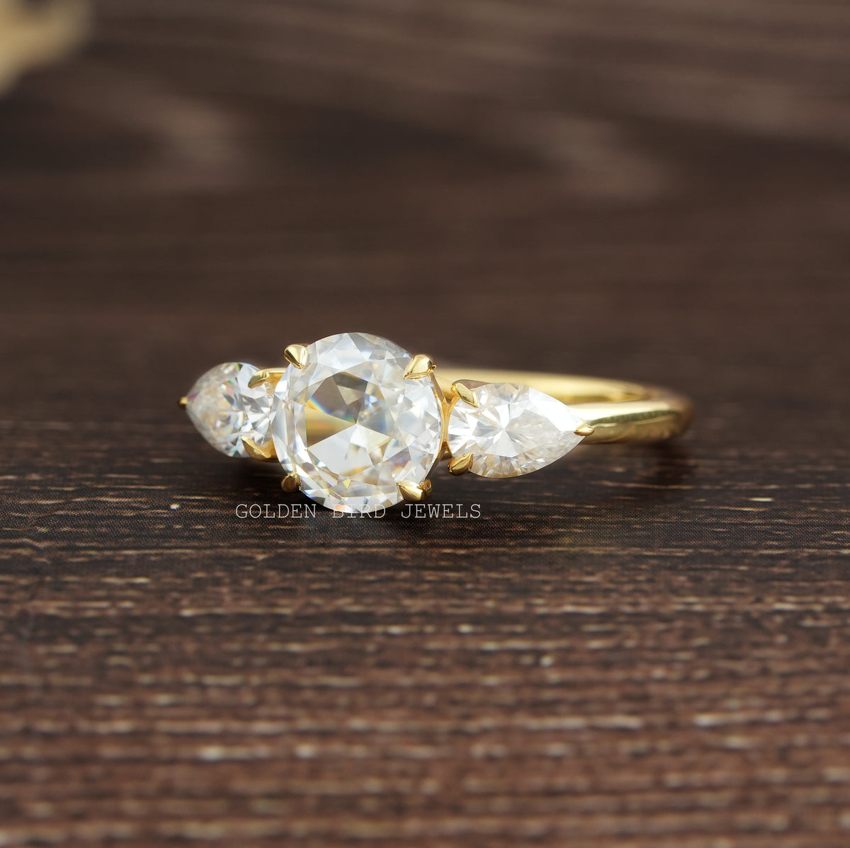 View of Moissanite Rose Round Cut 3 Stone Ring In Yellow Gold