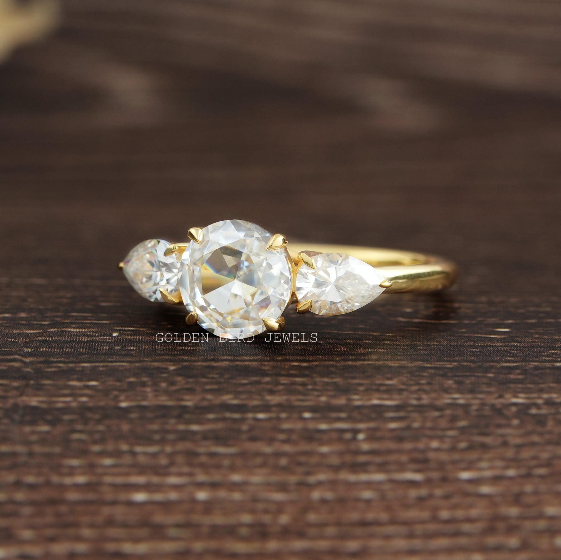 View of Moissanite Rose Round Cut 3 Stone Ring In Yellow Gold