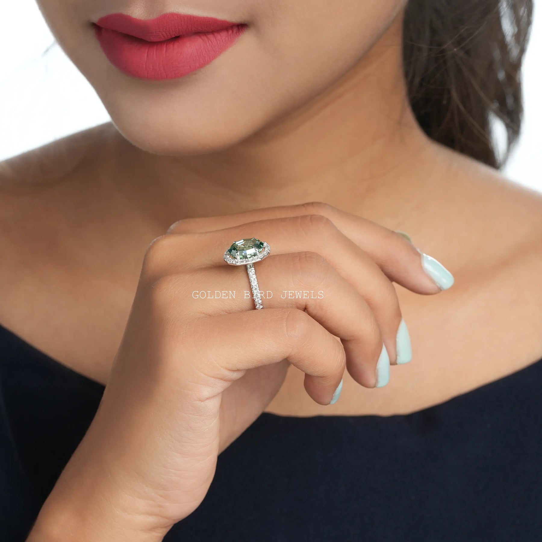 Side view of toi et Moi moissanite engagement ring
