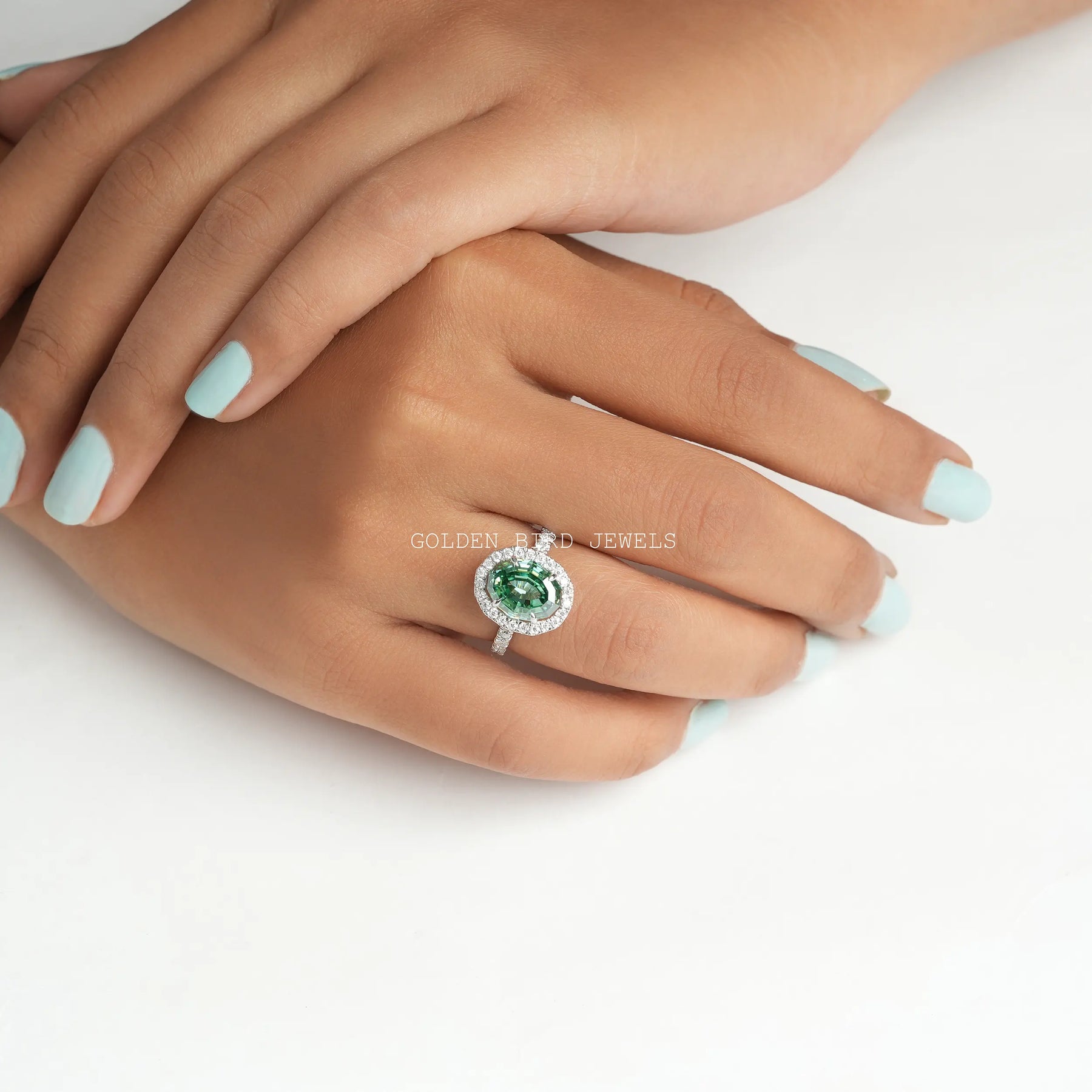 Dark Green Step Cut Oval moissanite ring in VVS Clarity