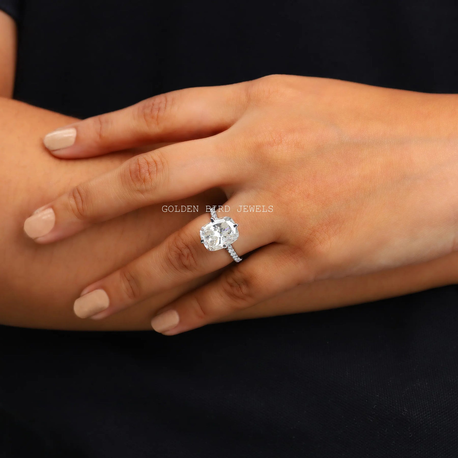 View of Cushion Cut Moissanite Engagement Ring In finger