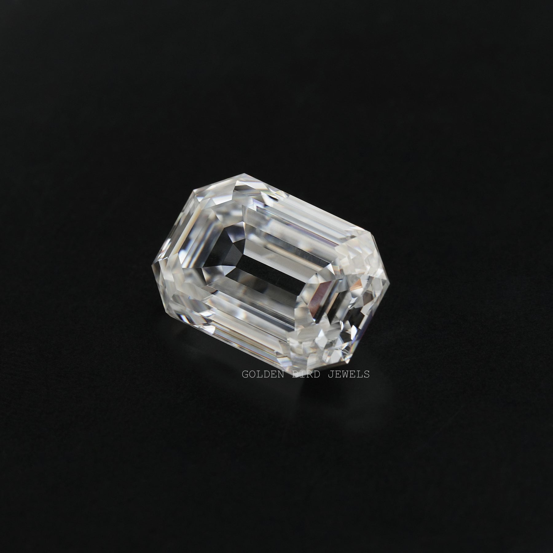 Close view of Old Mine Emerald Cut Loose Moissanite