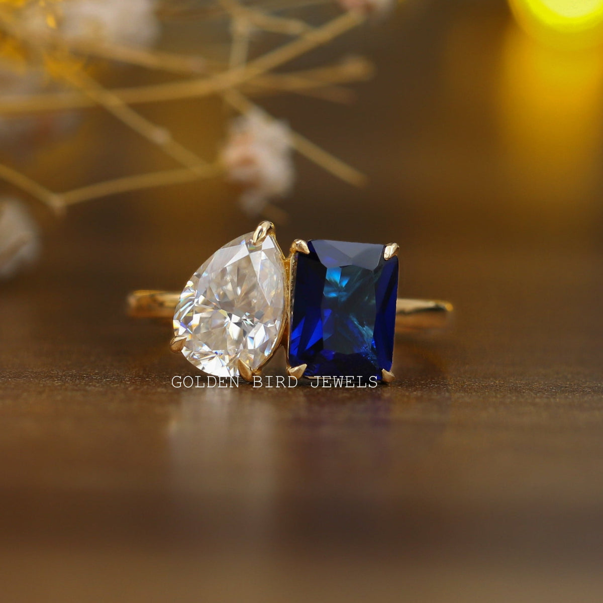 View of Emerald & Pear Cut Toi Et Moi Engagement Ring In Yellow Gold