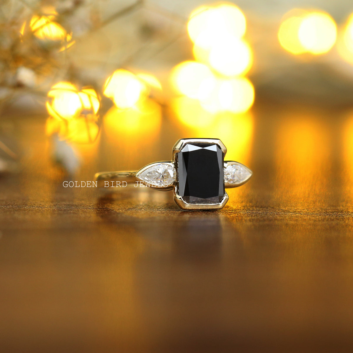 Close view of Black Radiant Cut Moissanite 3 Stone Ring