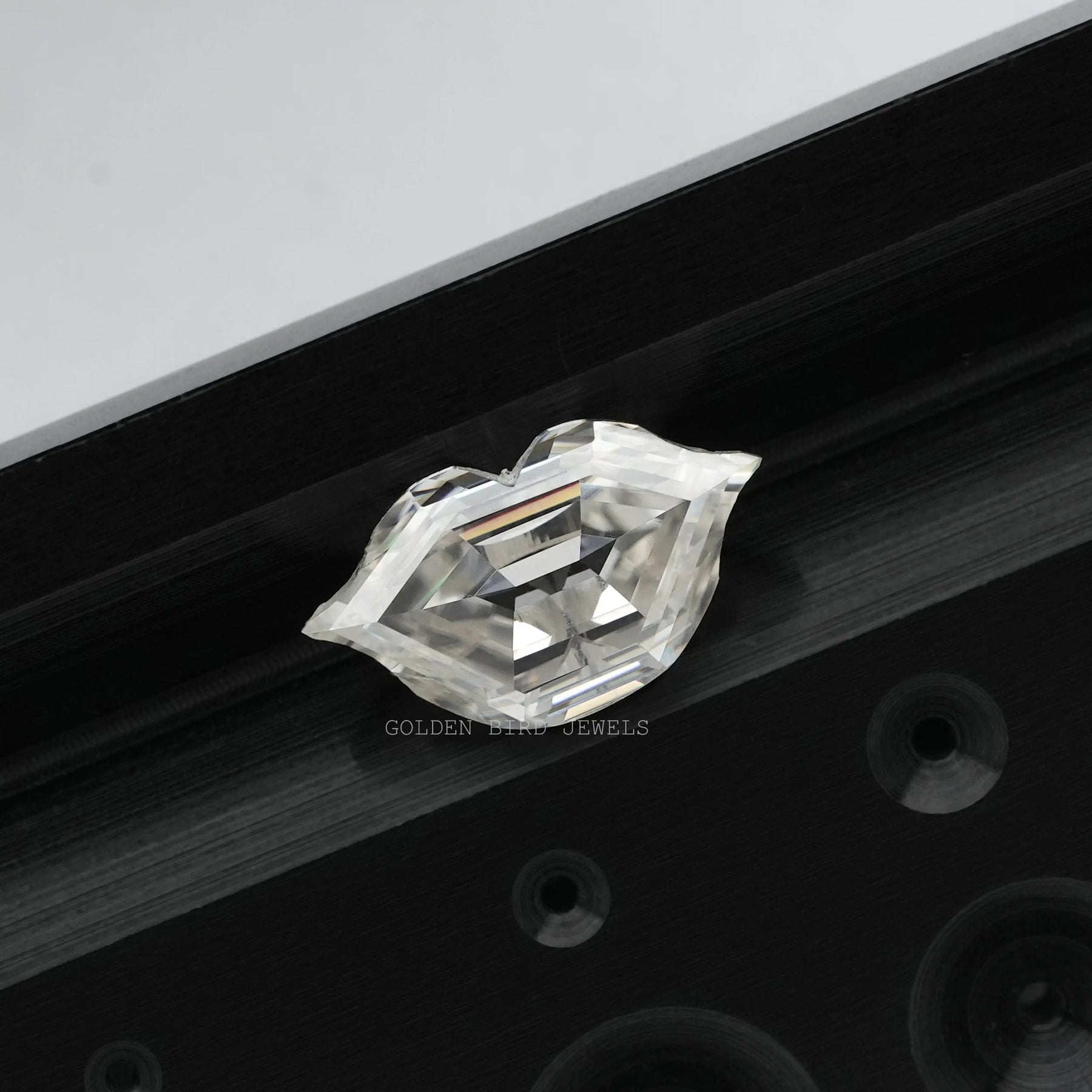 View of Antique Lips Shaped Loose Moissanite In White