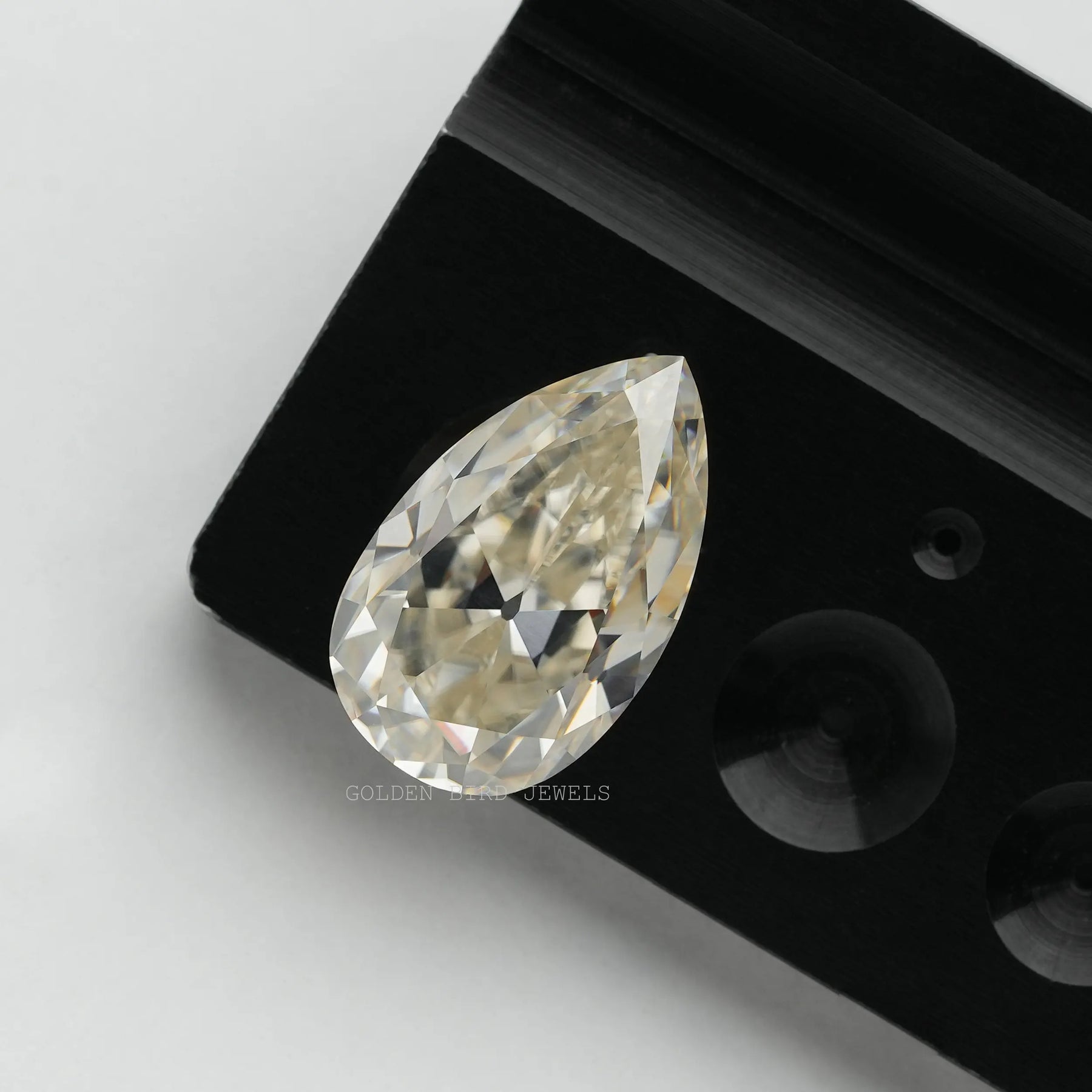 Near colorless 8.11 carat pear shape old mine cut loose moissanite stone