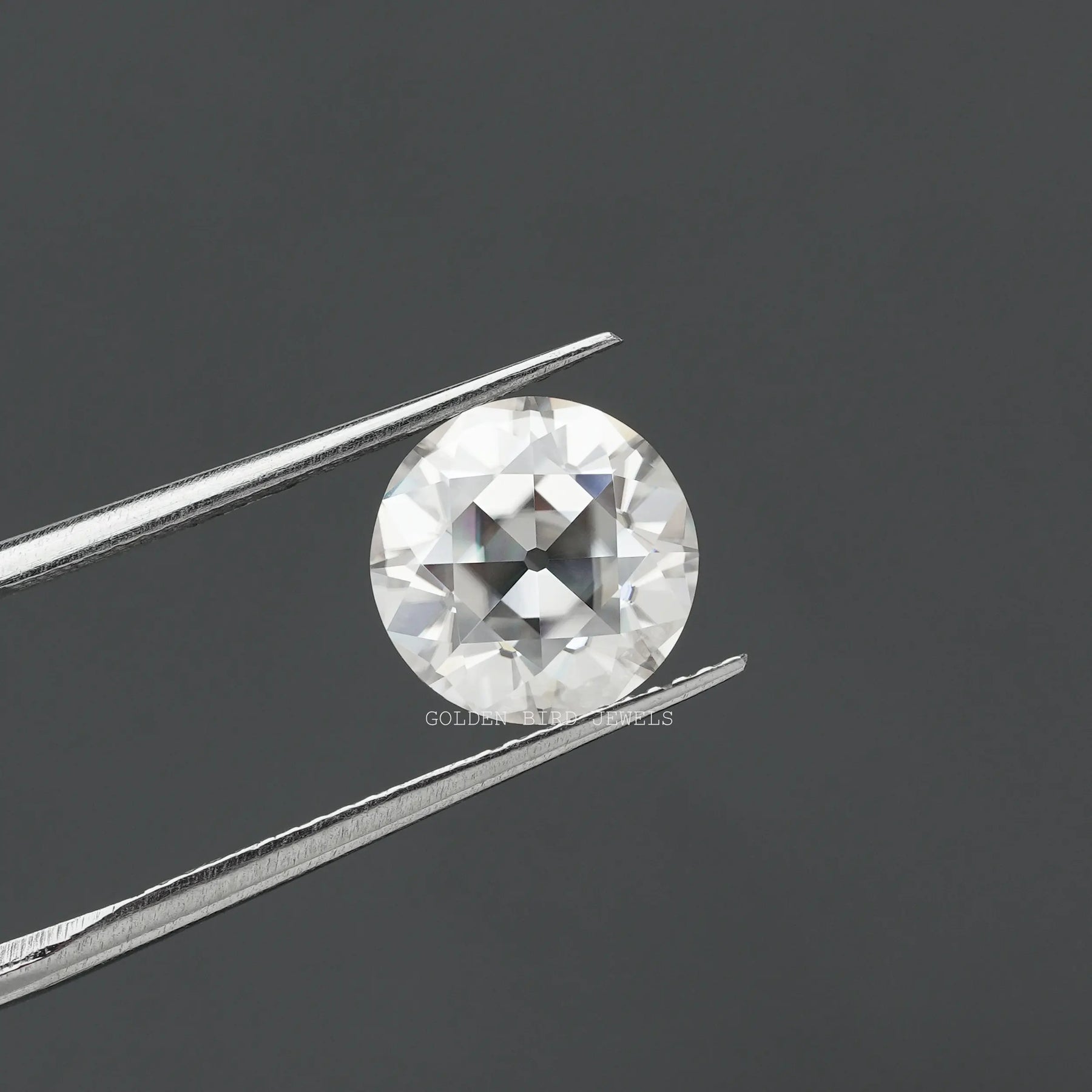 In tweezer front view of 3.28 CT Colorless Old European Round Cut Loose Moissanite