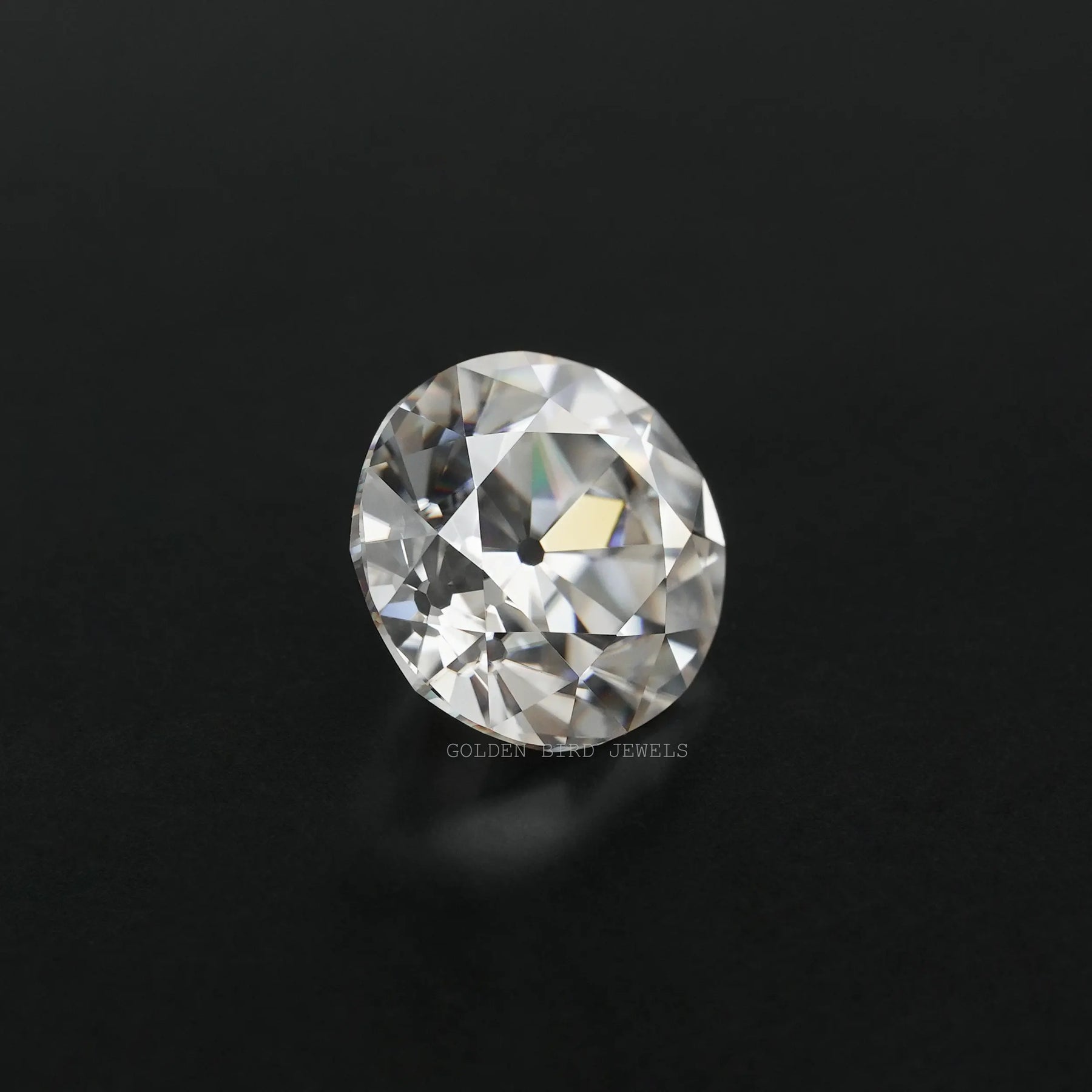 side view of colorless old european round cut moissanite loose stone