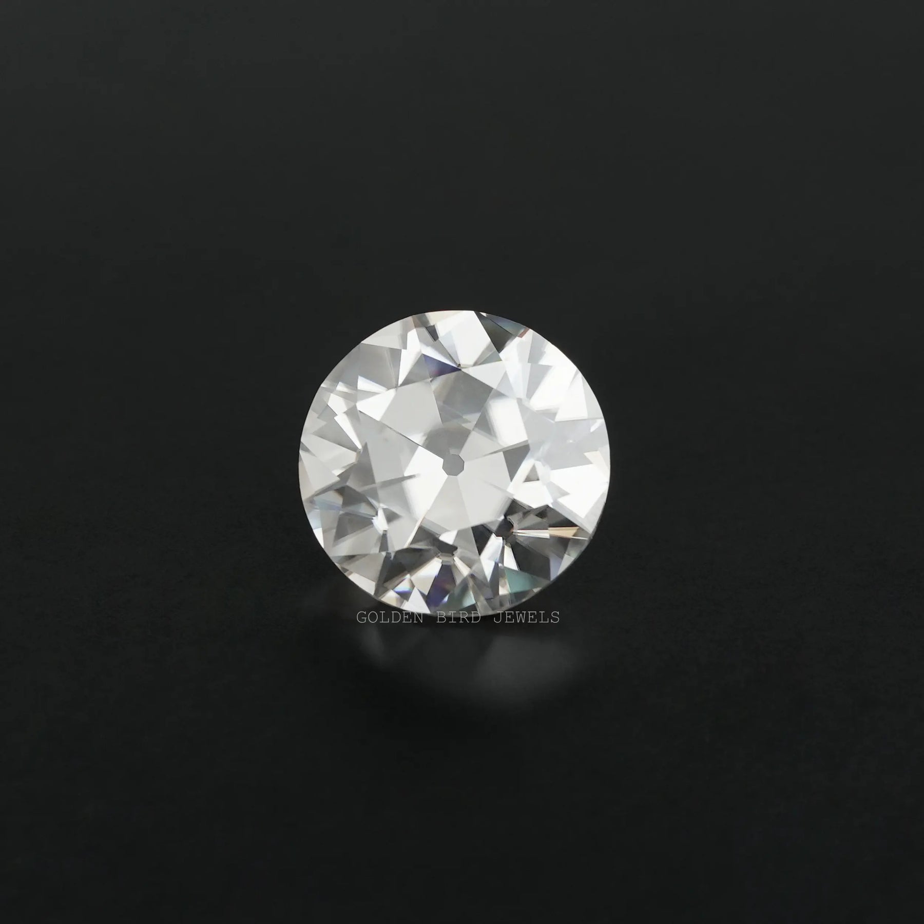 Front view of an round cut single stone showing its clear shape and sparkle.