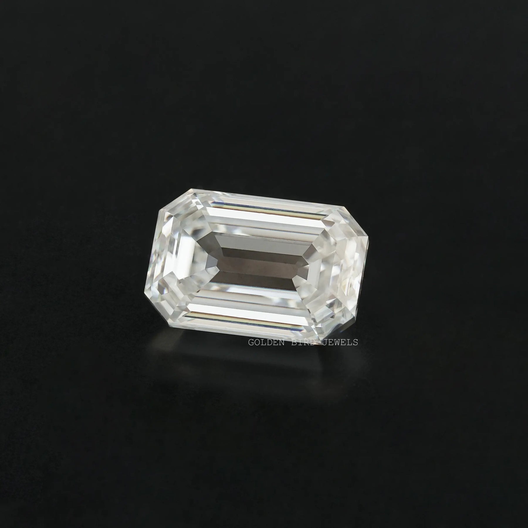 Close view of Moissanite Old Mine Emerald Cut Loose Stone