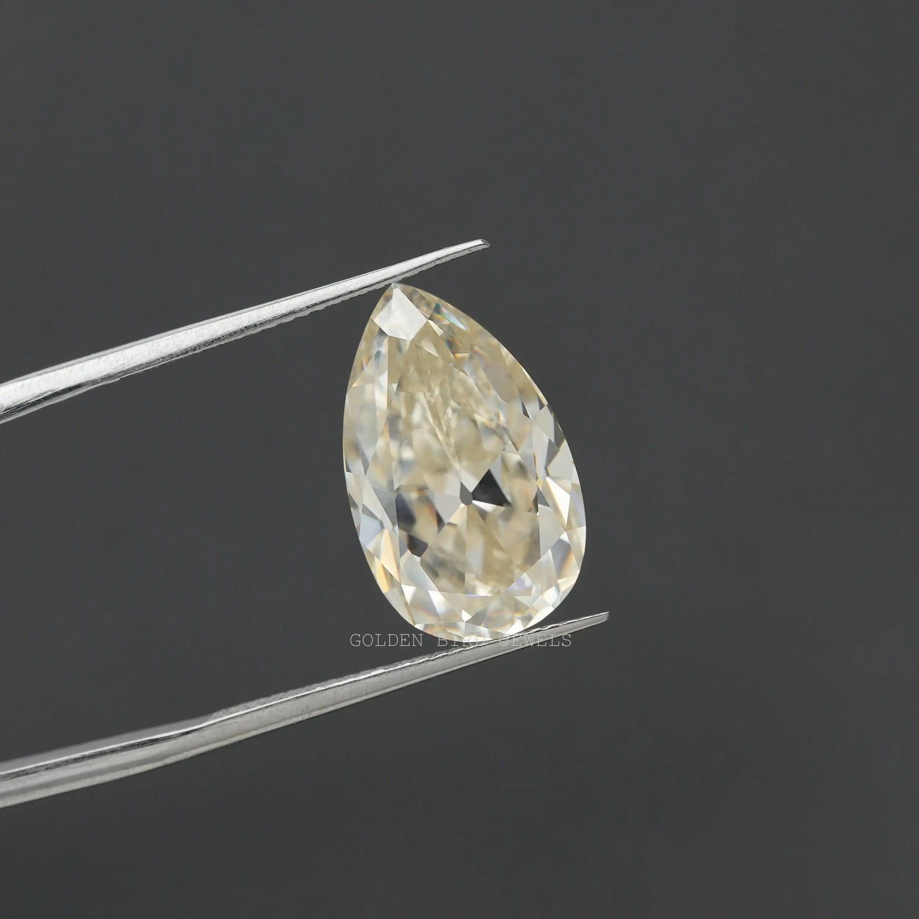 In tweezer Antique old mine pear cut loose moissanite