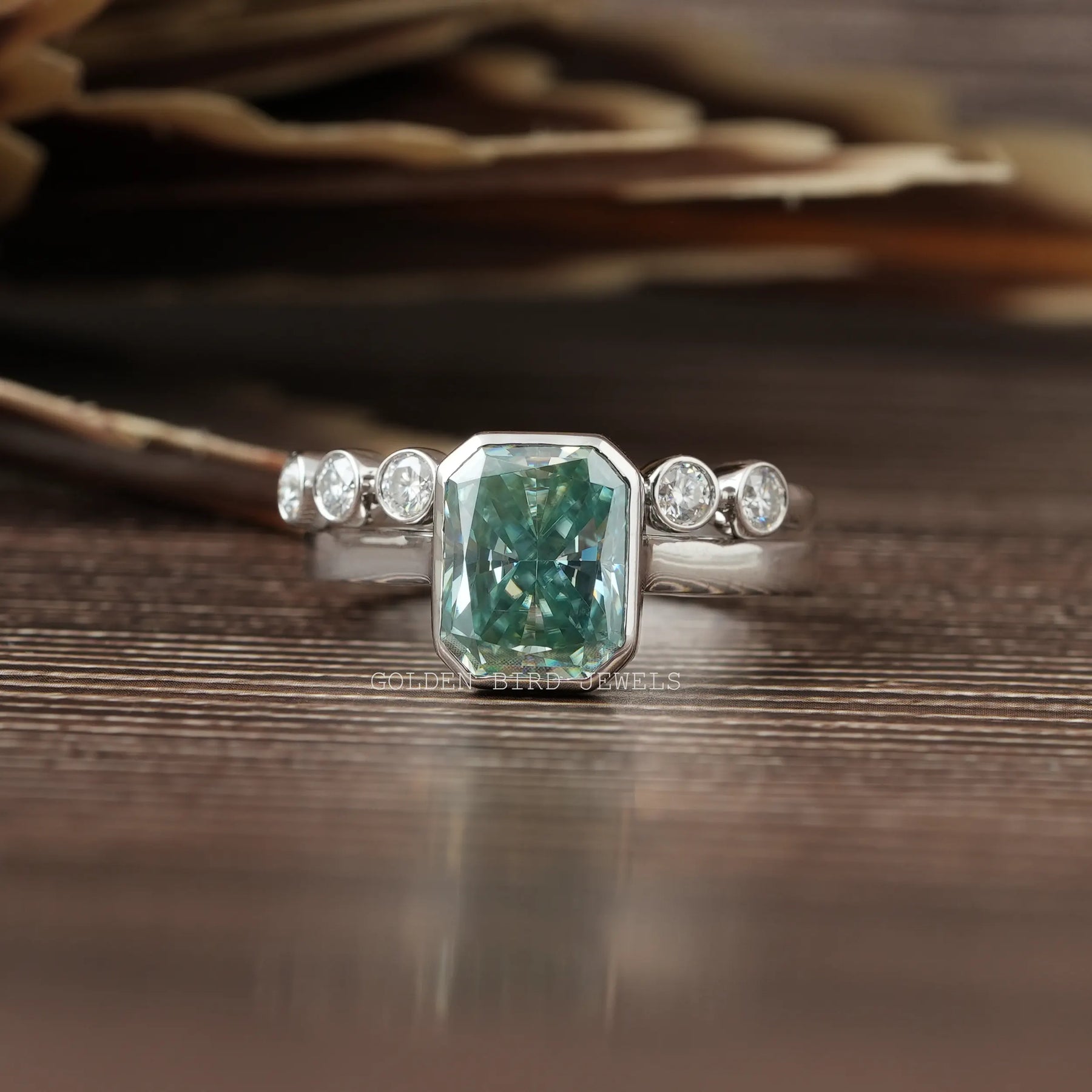 View of Radiant Cut Moissanite Bezel Set Ring In 14k White Gold