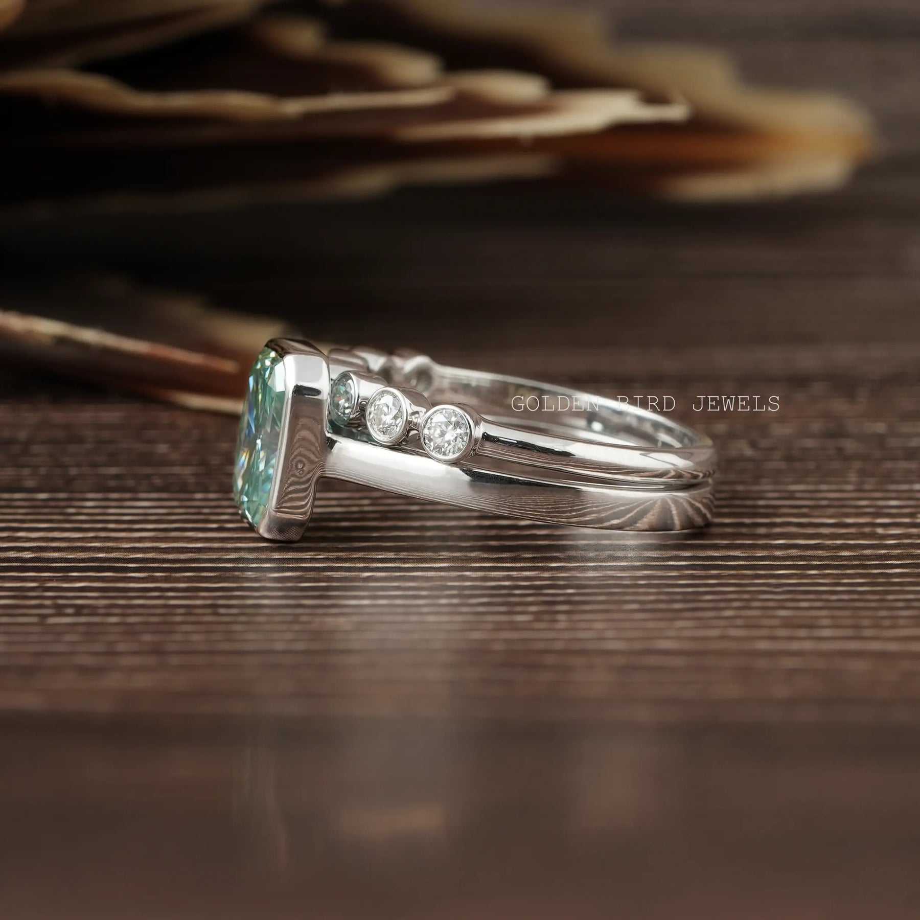 View of Blue Moissanite Bezel Set Ring In Finger