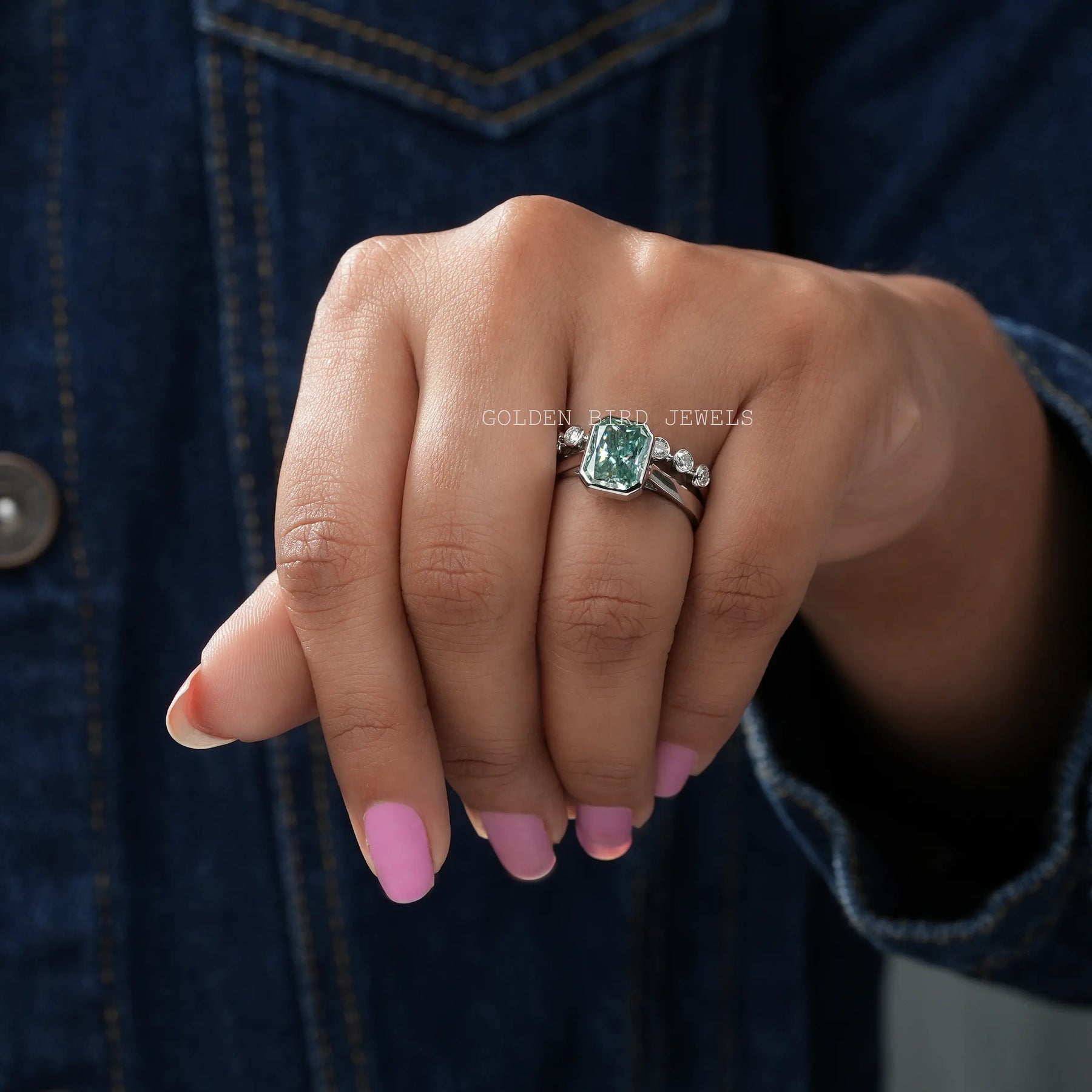 View of Radian Cut Blue Moissanite Ring In Yellow Gold