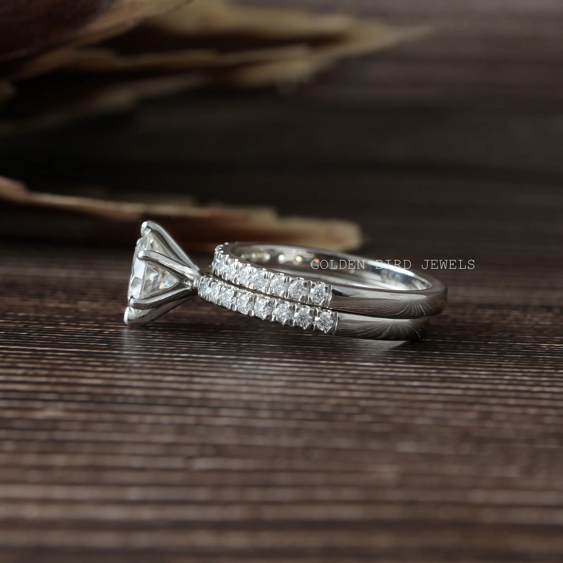View of Moissanite Round Cut Wedding Band In Finger