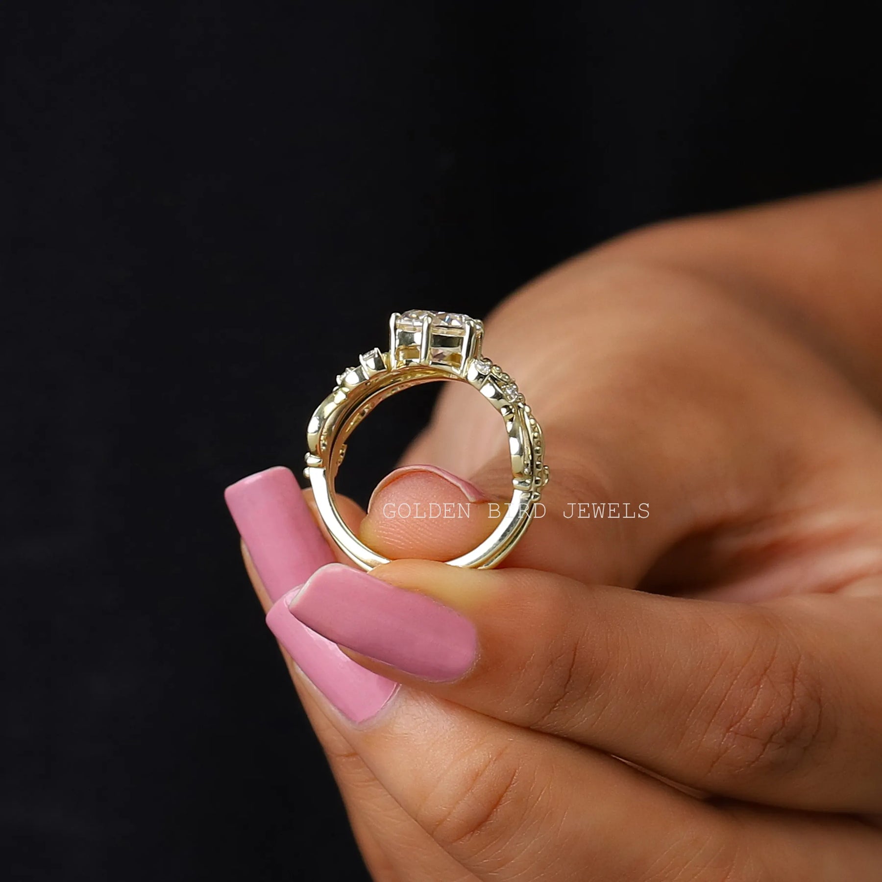 Back view of moissanite engagement ring set in a secure setting