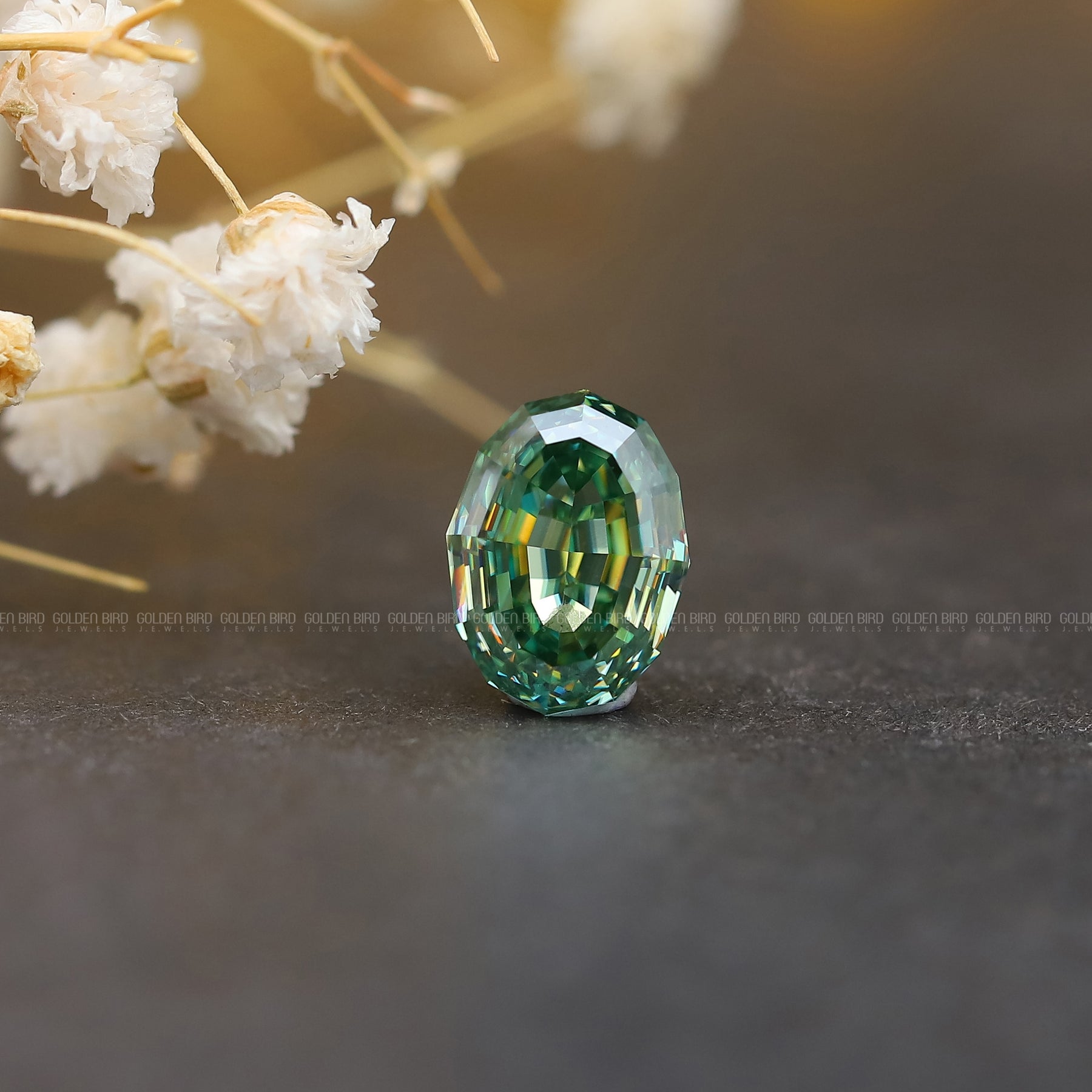 Top View Of Blue Green Oval Cut Loose Moissanite