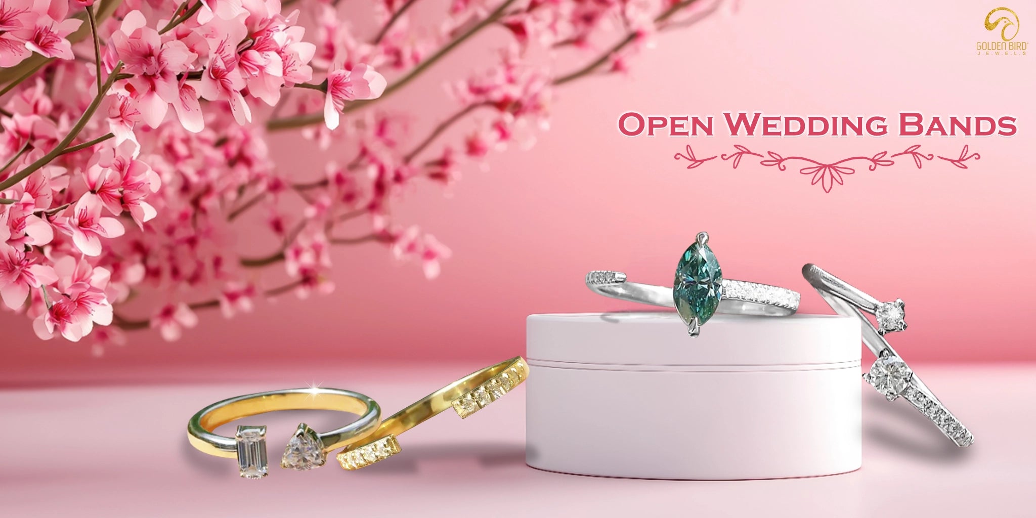 A group of diffrent types of open wedding band made by goldenbird jewels, with pink bacground and pink flowers