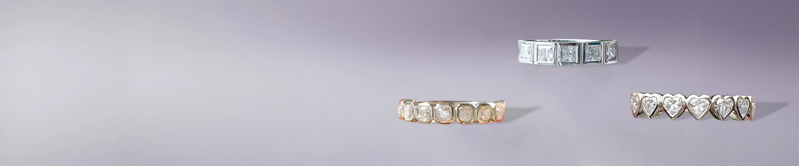 Bezel set moissanite rings with square, round, and heart-shaped stones in bold metal bands