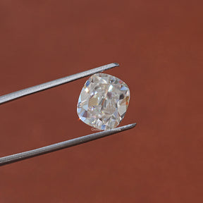 In Tweezer View Of Moissanite Cushion Cut Loose Stone