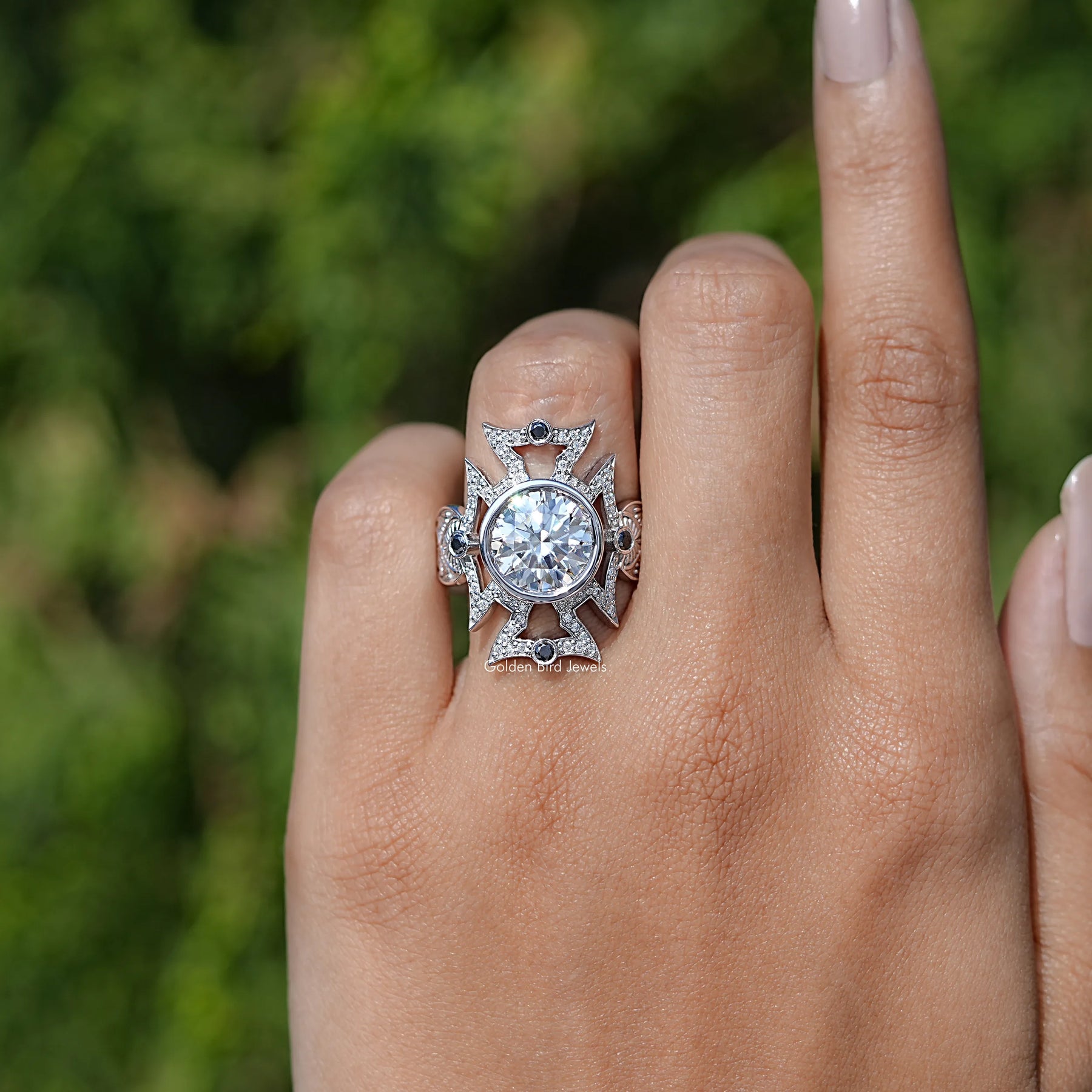 In finger front view of Moissanite Engagement Ring in Round Cut Stone