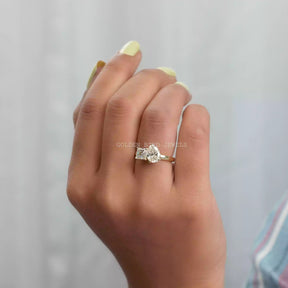 In finger view of multi shape moissanite  ring 