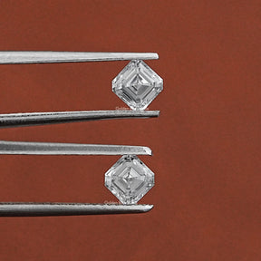 Tweezer holding the Asscher Cut Lab Grown Diamond Pair