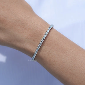 In hand Showing View of Asscher Cut Diamond Tennis Steel Bracelet
