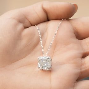 In hand showing view of moissanite pendant	