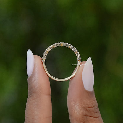 Gold-tone ring profile with baguette lab diamonds set across top half