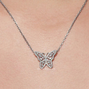 View of colorless butterfly round cut moissanite pendant 