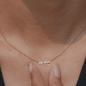 View of Baguette Cut Diamond Cluster Pendant In Yellow Gold