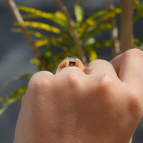 Back View of Bezel Set Emerald Cut Moissanite Ring In finger