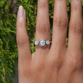 View of Round Cut Lab Diamond Three Stone Ring In White Gold