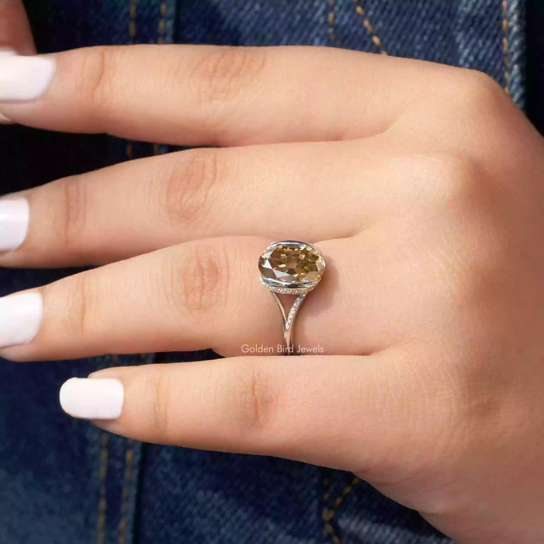 Close-Up View of Old Mine Oval Cut Engagement Ring In White Gold