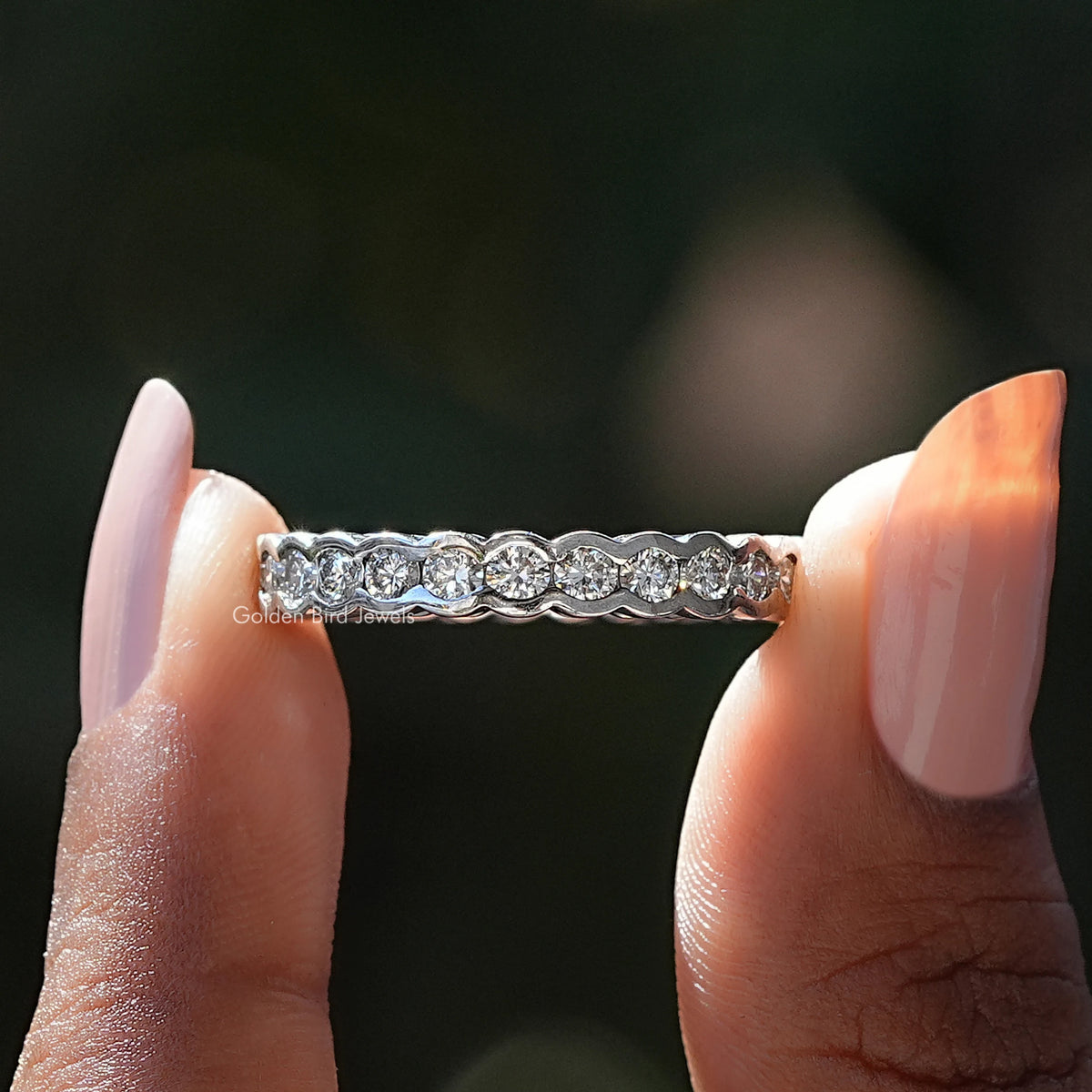 Front View of Bezel Set Round Cut Diamond Wedding Band In two Fingers