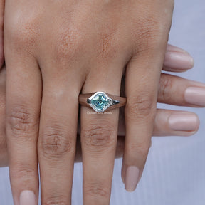 In finger front view of Asscher Moissanite Solitaire Engagement Ring in unique shape