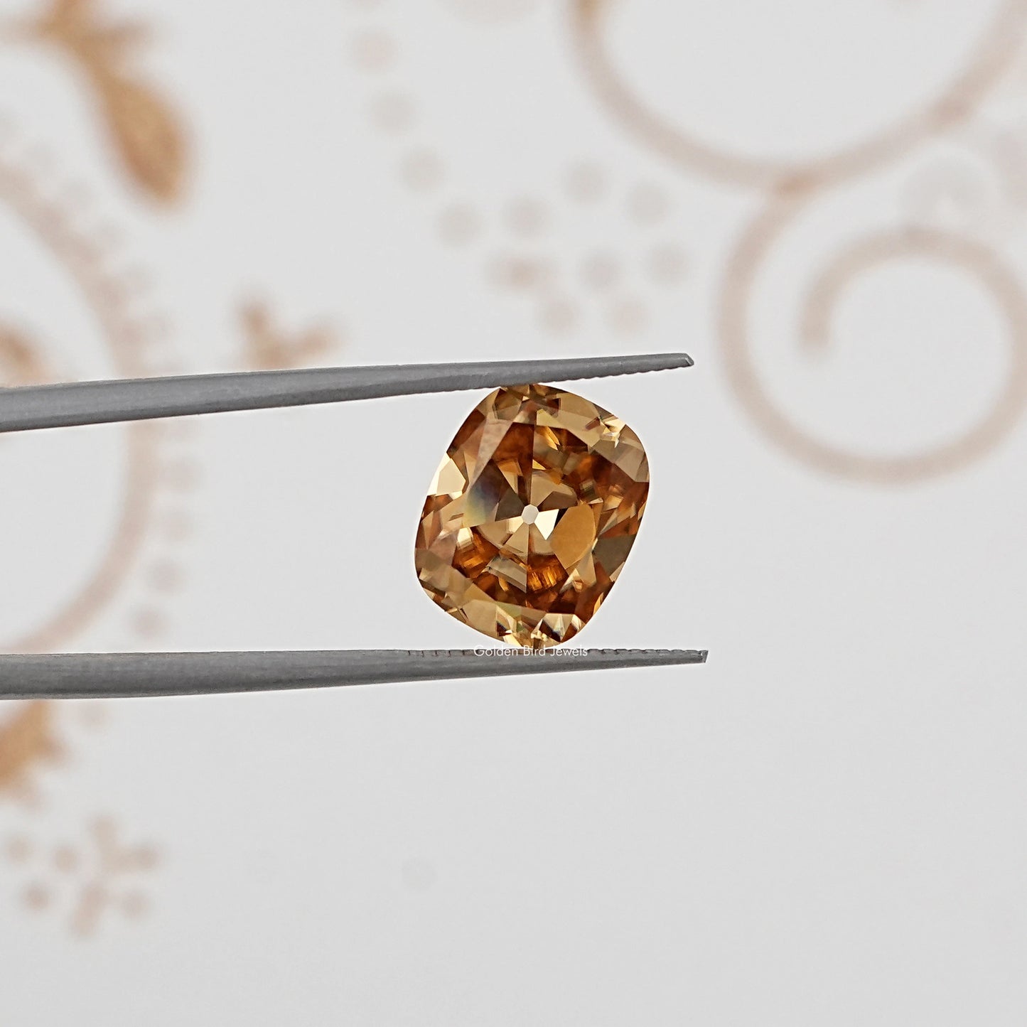 In Tweezer View Of Old Mine Cushion Loose Moissanite Stone