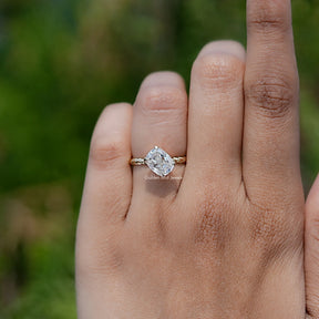 In finger front view of  Cushion Cut Moissanite engagement ring 