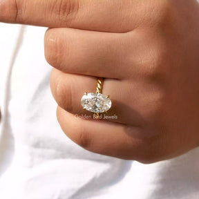 View of Colorless Oval Cut Moissanite Ring In Yellow Gold