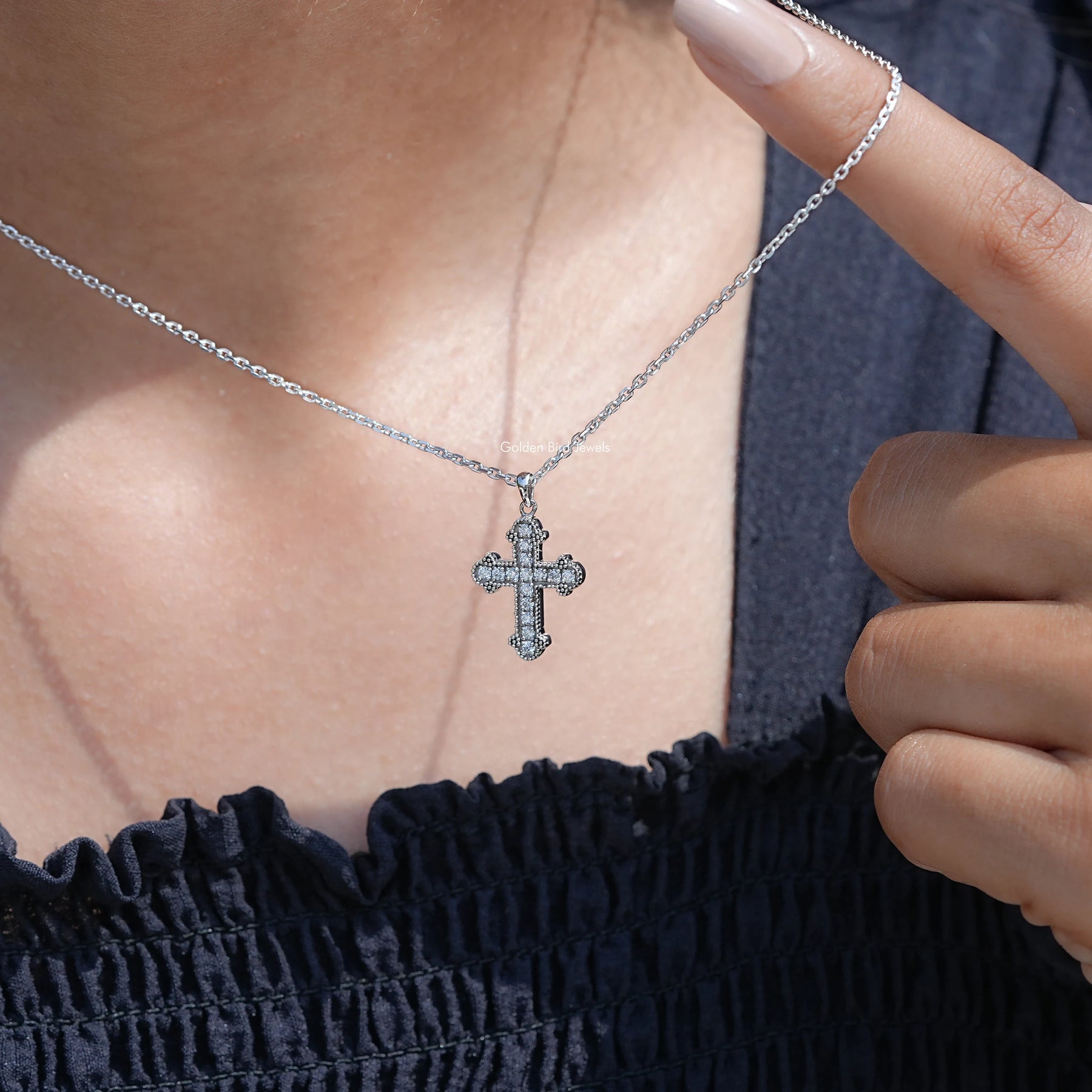 Detailed View OF Round Cut Moissanite Encrusted Cross Pendante 
