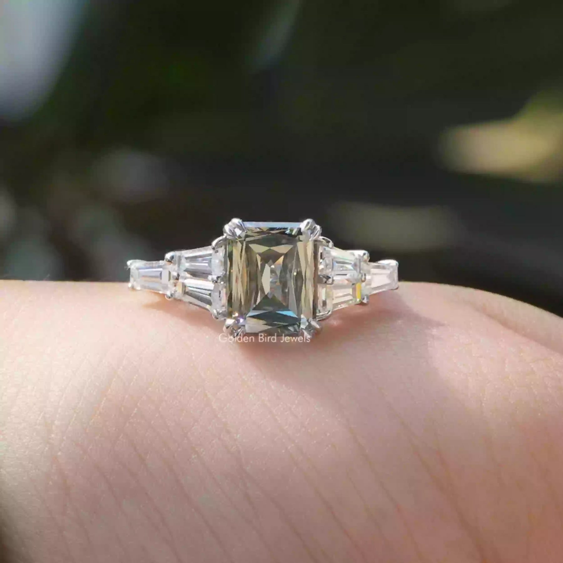 View of Grey Criss Cut And Tapper Baguette Moissanite Ring In White Gold 