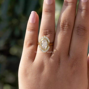 View of Oval Cut Moissanite Halo Ring In Yellow Gold