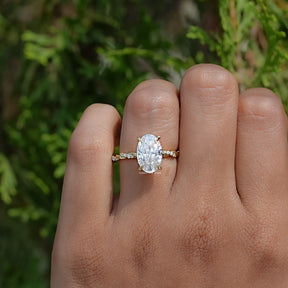 View of Ice Oval Cut  Moissanite Twist Shank Ring In Yellow Gold