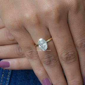 Detailed View of Oval Cut Moissanite Hidden Halo Ring In Yellow Gold