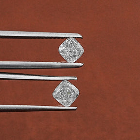 In Tweezer View Of Cushion Cut Lab Grown Diamonds