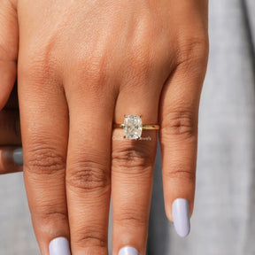 View of Moissanite Cushion Cut Solitaire Ring In Yellow Gold