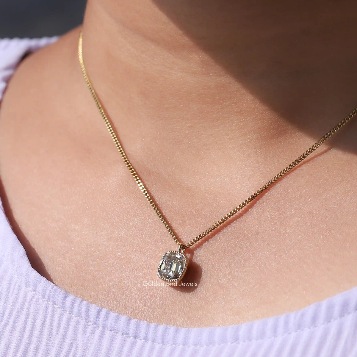 In neck view of Cushion cut statement moissanite halo pendant 
