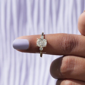 In finger View of Diamond Cushion 3 Stone Engagement Ring